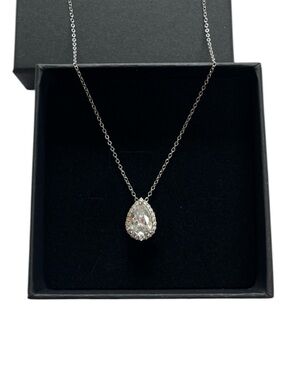 Sterling silver necklace, CZ pear shaped pendant. Sparkly.
Stamped 925